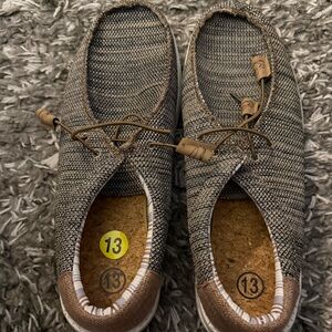 Not Hey Dudes but just as comfortable.  Brand new size 13 brown and grey.